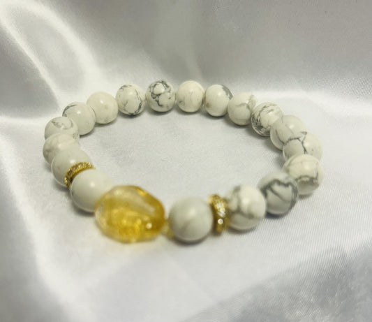 White stone with Yellow Gem